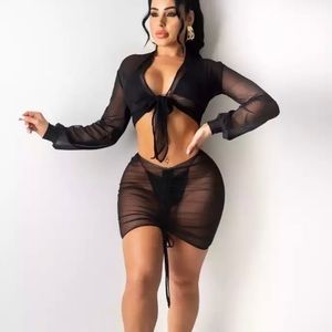 This is a two piece see through bikini coverup set